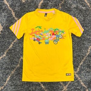 Adidas Lego Kids Yellow tee with Graphic design with lavender lines size Small
